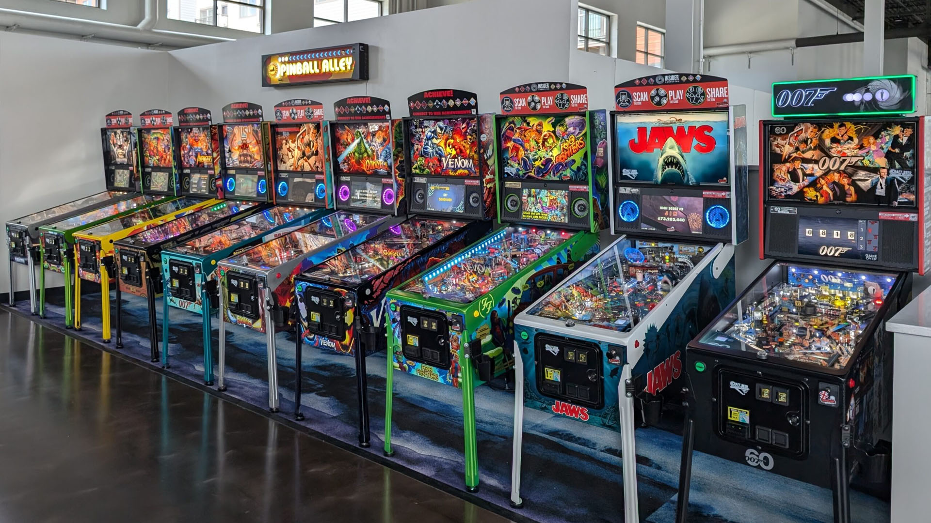 Pinball tables lined up at the Kickback Bar in Middleton WI