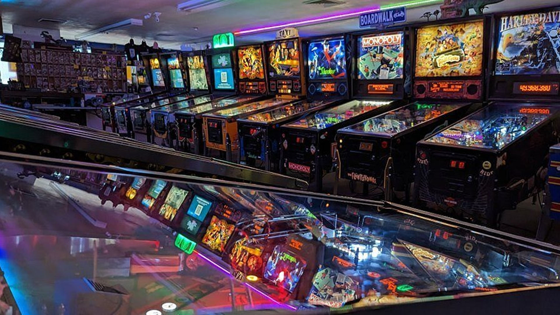 A line of pinball tables at nerdhaven arcade