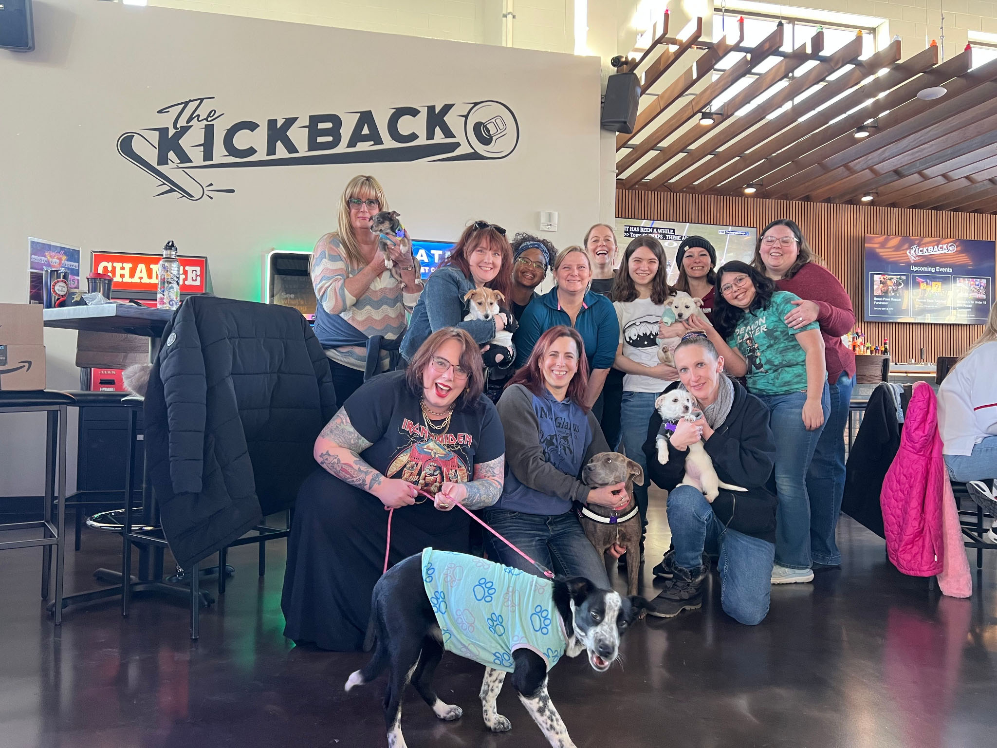 Belles and Chimes at Kickback holding puppies